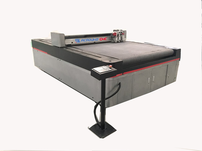 CNC <a href=http://www.cnccuttingsolution.com target='_blank'><a href=http://www.cnccuttingsolution.com/oscillating-knife-cutting-solutions.html target='_blank'>oscillating knife cutting machine</a>s</a> for leather/ fabric /cloth with automatic feeding device